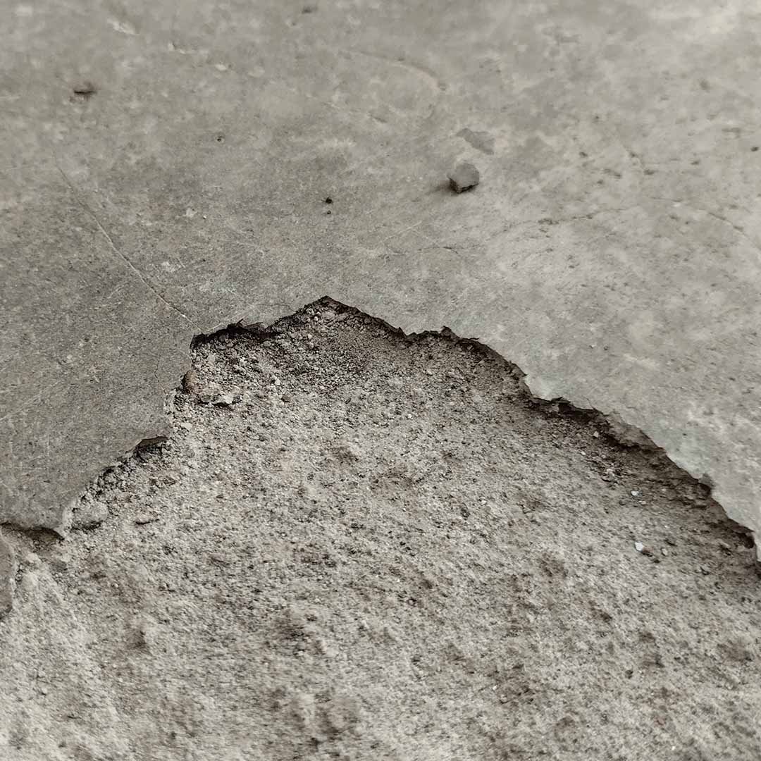 Spalling Concrete: Causes, Prevention, and Long-Term Repair Solutions